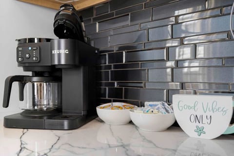 Start your day right in this charming coffee space, the perfect nook to brew your favorite cup and unwind.