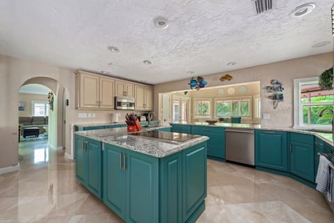 Spacious, well-equipped kitchen — perfect for family breakfasts, group dinners, and everything in between.