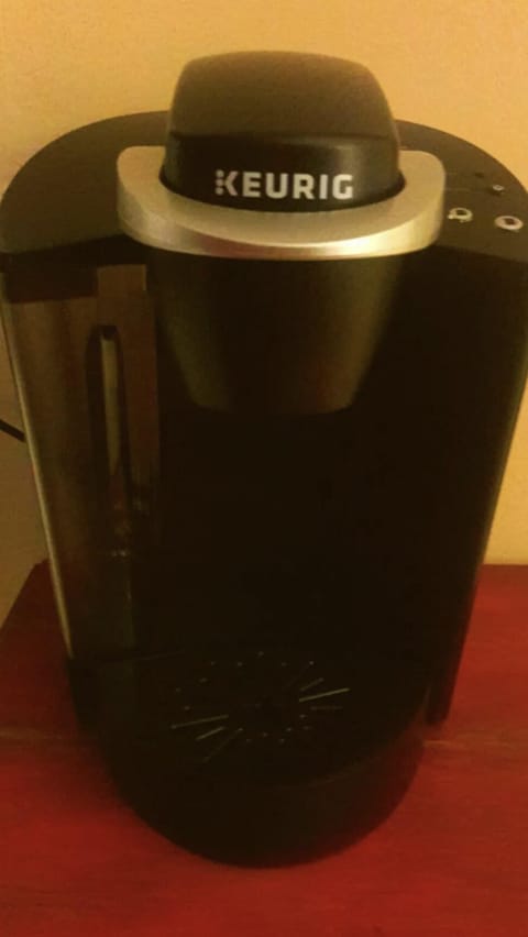Keurig coffee maker with decaf and regular pods in your coffee station.