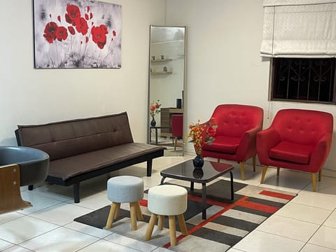 Economy Apartment | Living area | 55-inch Smart TV with digital channels, Netflix, first-run movies