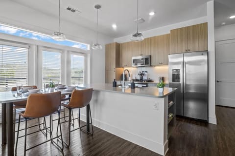 You are surrounded by tasteful decor and warm tones, making the dining room a perfect setting for any occasion.