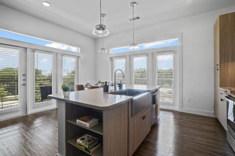 The spacious dining room invites you to savor every moment, whether enjoying a quiet meal or hosting a festive gathering.