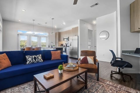 Once you enter the living room you'll find a space that feels both luxurious and cozy, perfect for unwinding after a long day.