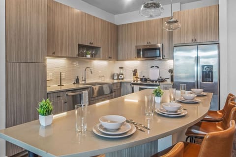 As you take your seat, the dining room's sophisticated design sets the stage for memorable meals and conversations.