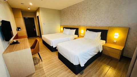 Deluxe Triple Room, Non Smoking | In-room safe, desk, laptop workspace, blackout drapes