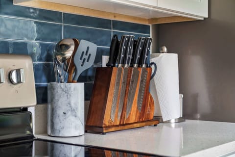 Love to cook? Our kitchen is stocked with premium essentials, including a professional-grade knife set and high-quality utensils. Whether you're preparing a quick snack or a gourmet dinner, you'll have the right tools for the job at your fingertips.