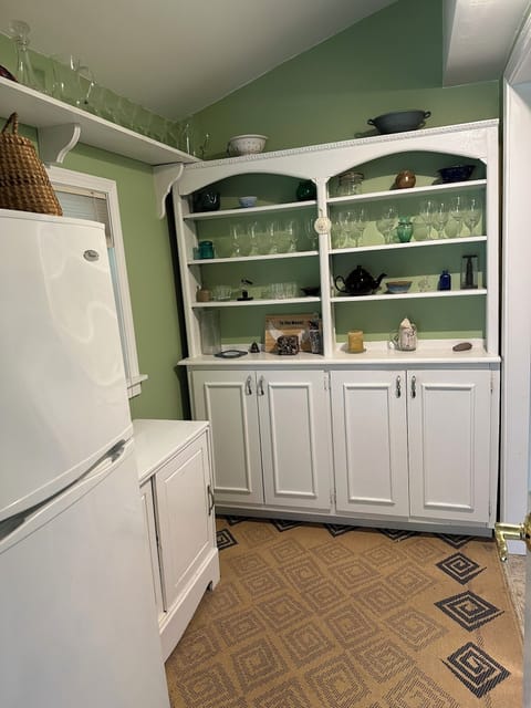 Extra fridge in bar area off of three season room.