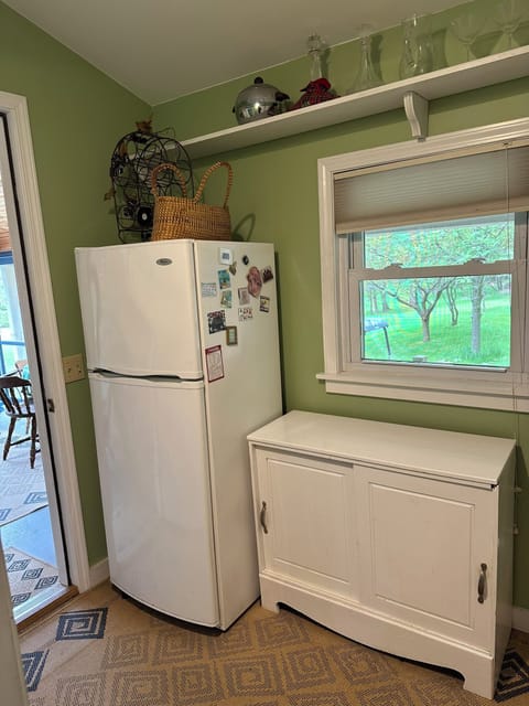 Extra fridge in bar area off of three season room.