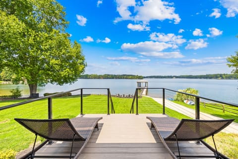 Relax on the back patio surrounded by the stunning view of Lake Norman!