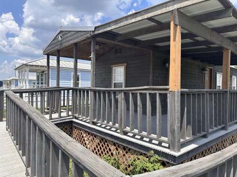 Cabin exterior with access ramp.