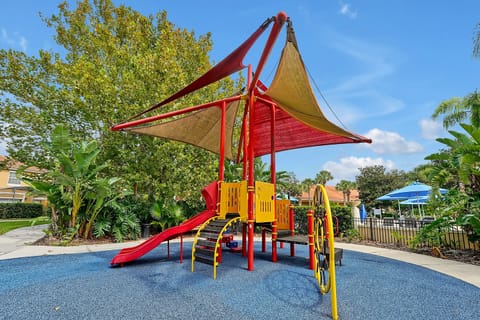 Fun time starts now! The resort features a brightly colored, shaded playground area, ensuring safe and exciting outdoor play for children of all ages.
