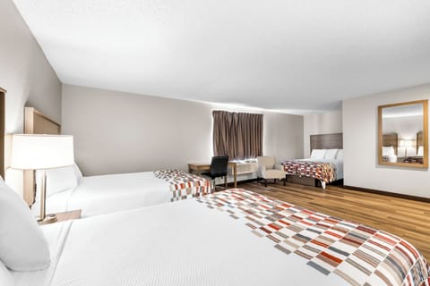 Deluxe Room, Non Smoking (2 Queen Beds and 1 Double Bed) | Desk, laptop workspace, blackout drapes, free cribs/infant beds