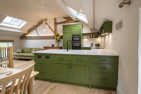 First floor: The well-equipped kitchen is unique and oozes contemporary  style