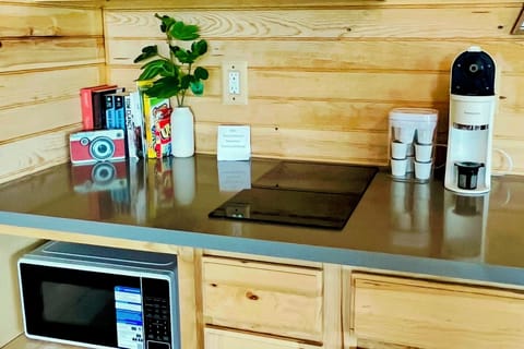 Microwave, 2 burner induction stove top, tea kettle, coffee maker