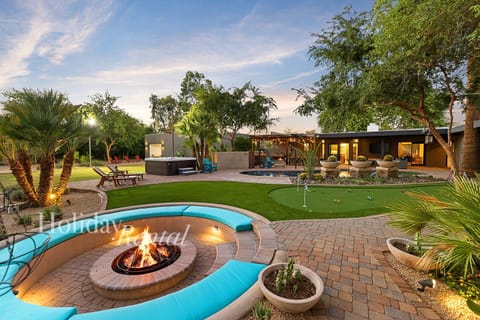 Putt, soak, and gather fireside—Scottsdale outdoor living at its finest.