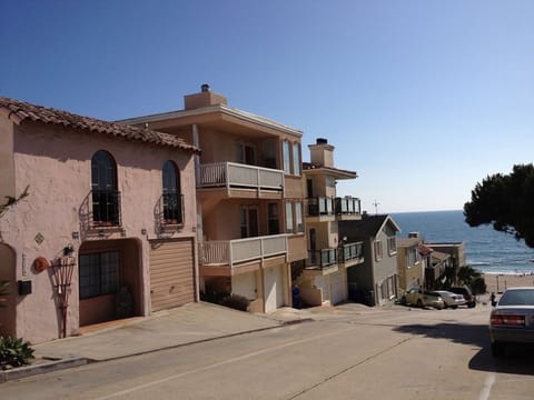 View of the front of the property and neighboring properties along our street.  The beach and Pacific Ocean is in the distance.