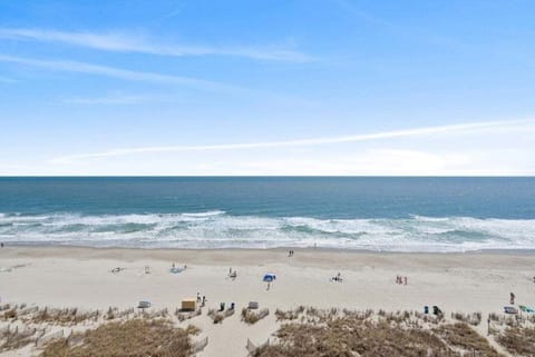 Oceanfront Balcony with Views - Relax on your private oceanfront balcony with views of the pool and Atlantic Ocean — perfect for morning coffee or evening breeze.