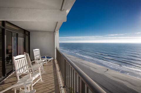 Oceanfront Balcony - Large private balcony overlooking the Atlantic Ocean with space to sit and enjoy the view of the beach and shoreline.