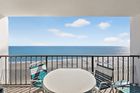 Oceanfront Balcony - Private balcony overlooking the Atlantic Ocean with space to sit and enjoy views of the beach and shoreline.