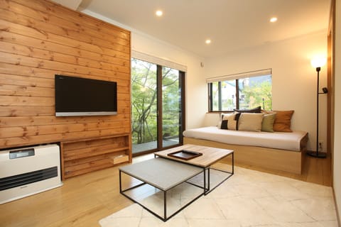 Cottage, 2 Bedrooms, Kitchen | Living area | 40-inch flat-screen TV with digital channels