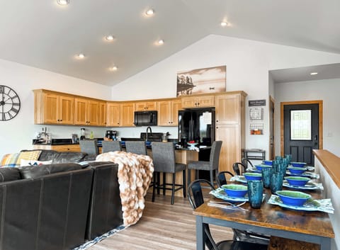The dining area opens up to the kitchen.