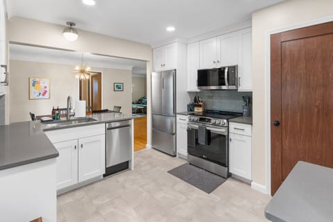 Your fully equipped kitchen features modern appliances and granite countertops, perfect for preparing meals during your stay.
