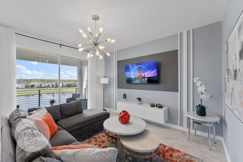 Living Room and Balcony #Disney #Parks #kingdom #springs #StoreyLake #resort #Apartment #Vacation #Rental #waterpark #Kissimmee #Orlando #universal #citywalk