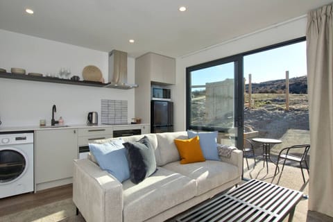 Great indoor / outdoor flow to your own patio. Note that lawn has now been laid, and a fence built since this photo was taken.