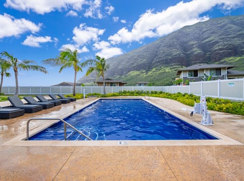 Resort-style pool with palms and mountain views!