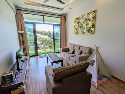 Apartment, Mountain View | Living area | 48-inch LED TV with digital channels