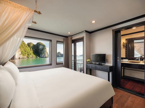 Premium bedding, desk, laptop workspace, soundproofing