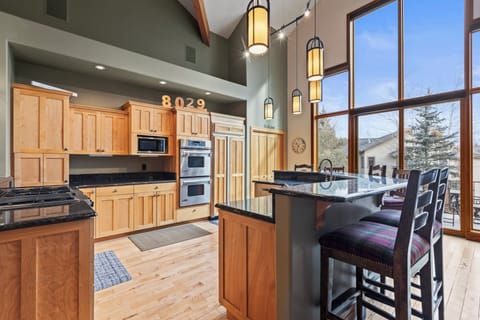 Cove Retreat offers a spacious kitchen, island and double ovens.