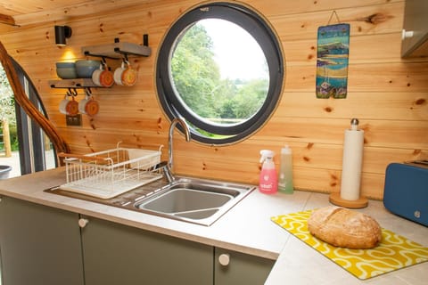 Kitchen sink with port hole window