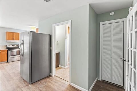Bathroom door by fridge