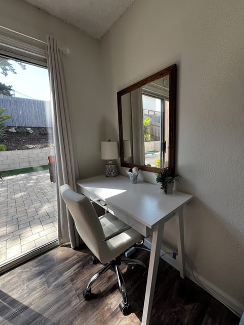Desk & mirror in bedroom #2. Also has a vanity mirror in the closet if desired.