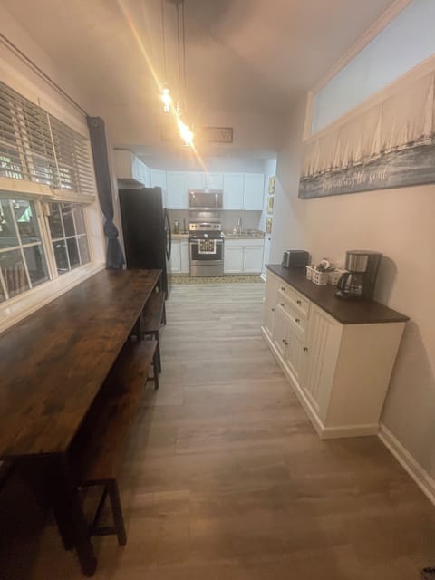 Full kitchen with fridge/ice/filtered water, buffet, stove/oven, microwave