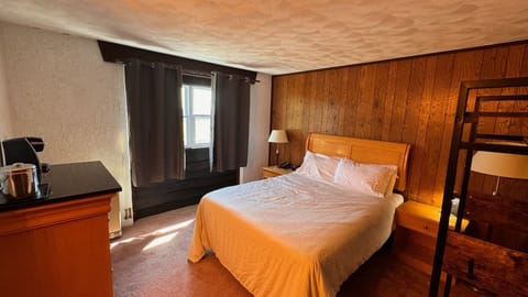 Premium bedding, blackout drapes, iron/ironing board, free rollaway beds