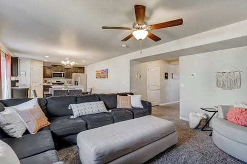 Gather with loved ones in the spacious and cozy living room, perfect for movie nights and relaxation.