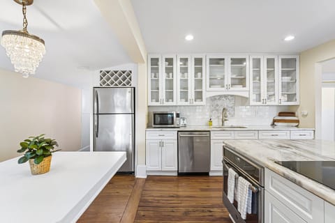 Classic charm meets modern convenience in this stunning kitchen. 