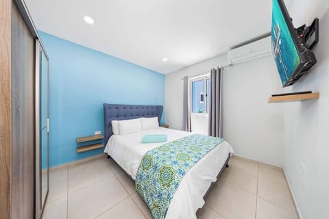 Enjoy downtime with a flat-screen TV available in every room, perfect for catching up on your favorite shows or unwinding after a day of exploring.