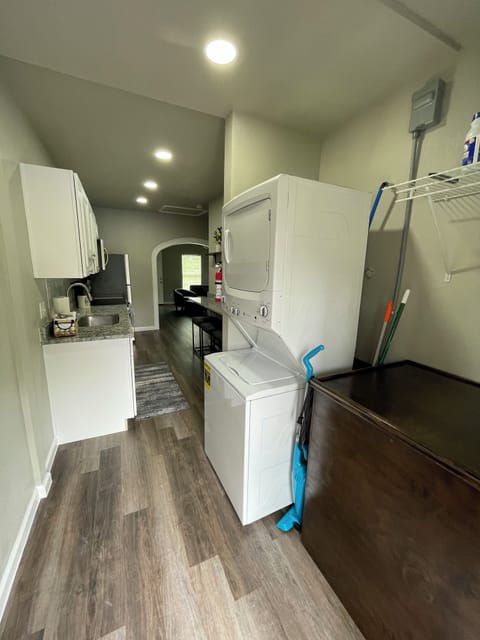 Private laundry area with washer and dryer