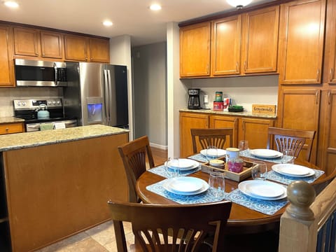 Fully equipped kitchen and dining area.