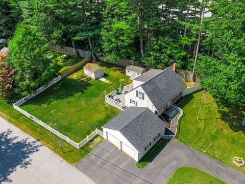 A bird's-eye view of the property showcasing its expansive yard—perfect for relaxation and outdoor fun!