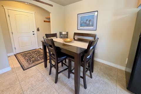 Gather around the dining table for food, conversation, and fun.