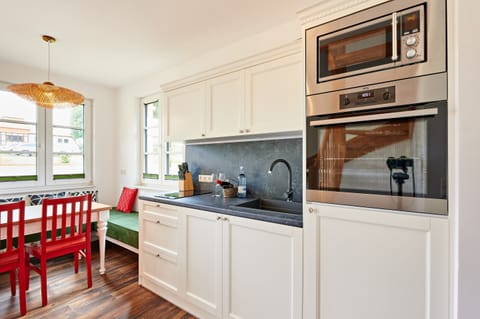 Apartment | Private kitchen | Electric kettle, toaster, highchair