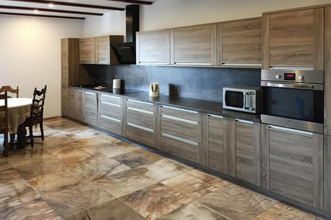 Villa | Private kitchen | Electric kettle, toaster, highchair
