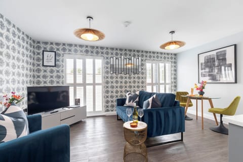 Apartment | Living area | 50-inch Smart TV with cable channels, Netflix, streaming services