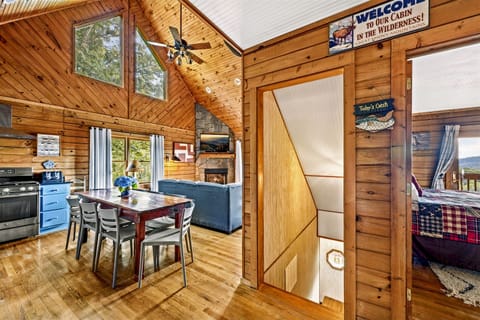 The main floor primary is to the right, bunk room and game room downstairs, and the kitchen/living room are to the left.