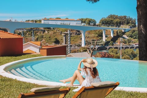 Outdoor pool, open 9:00 AM to 8:00 PM, pool umbrellas, sun loungers