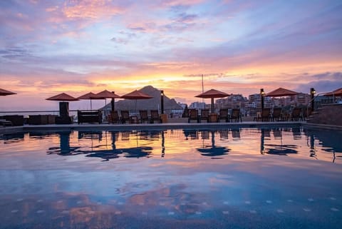 Outdoor pool, pool umbrellas, sun loungers